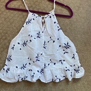 White blouse with blue flowers